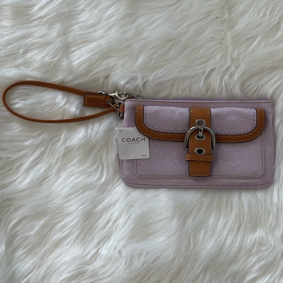 Coach Handbags - Coach Signature lilac wristlet